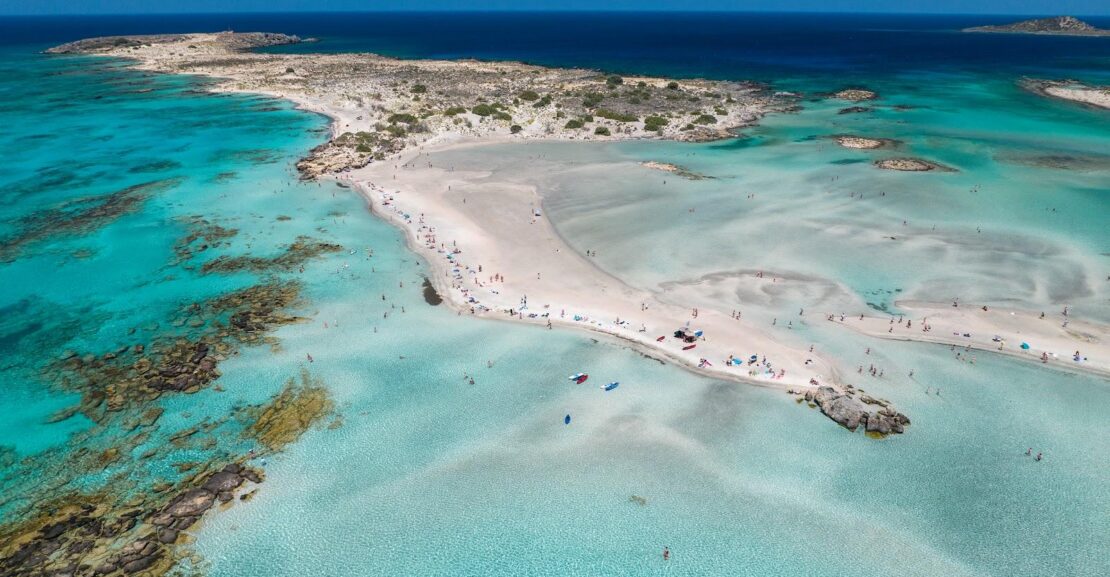 Elafonissi Beach in Crete with pink sand and crystal clear shallow waters